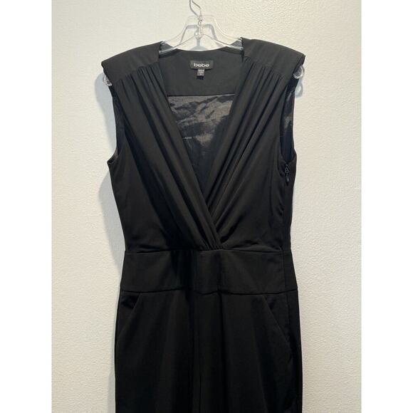 BEBE Women’s Size 10 Sleeveless Black Jumpsuit Pockets Deep V-Neck Classic Glam - Picture 6 of 8